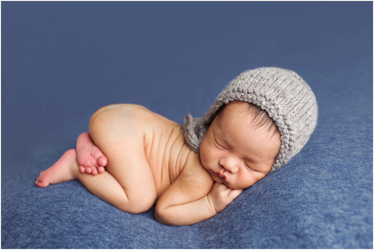 Okinawa Newborn Boy Photographer boy in bonnet