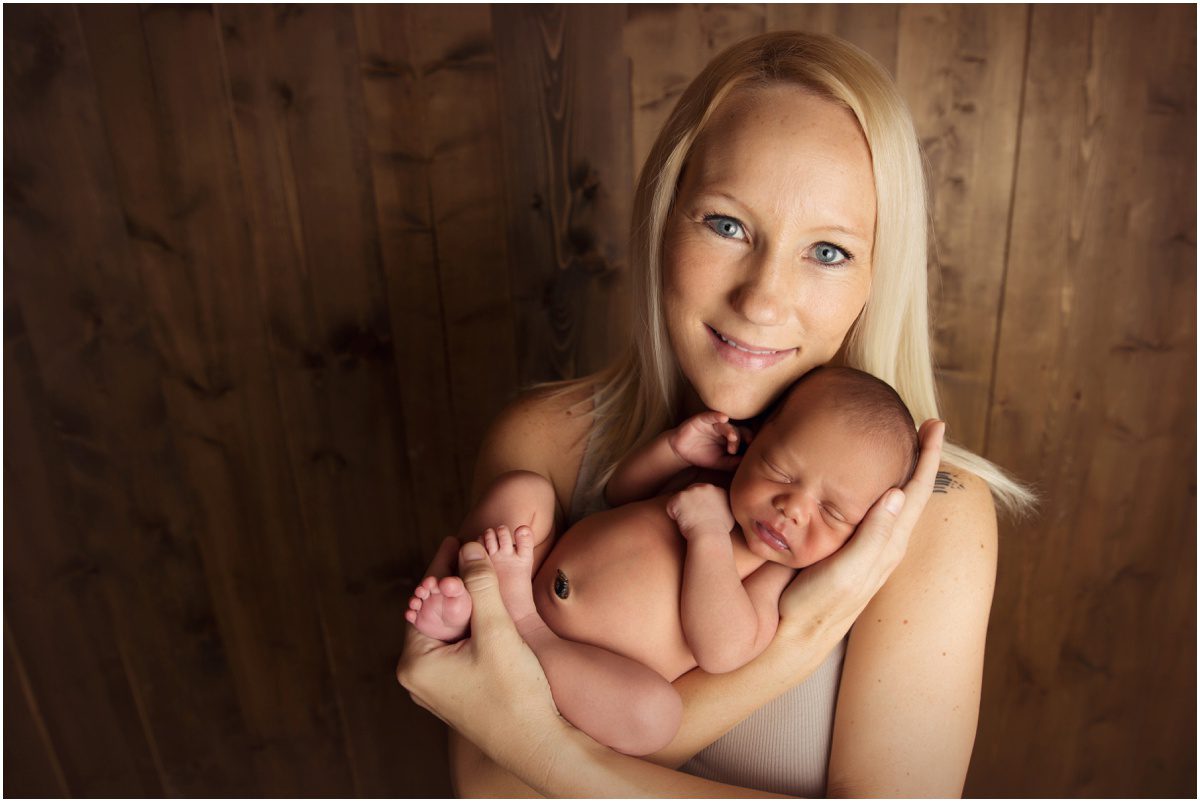 smiling mother orange-studio-newborn-photographer