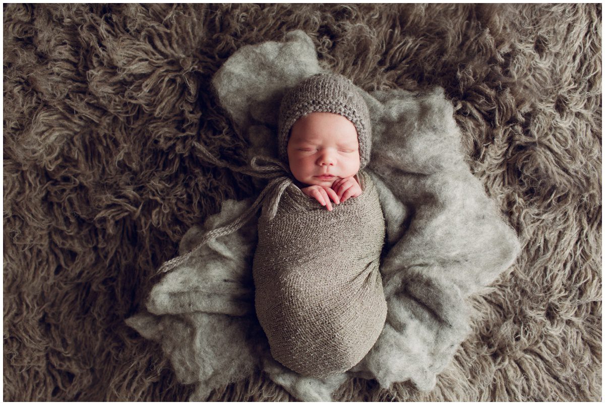 NEPA studio newborn photography baby laying down in bonnet