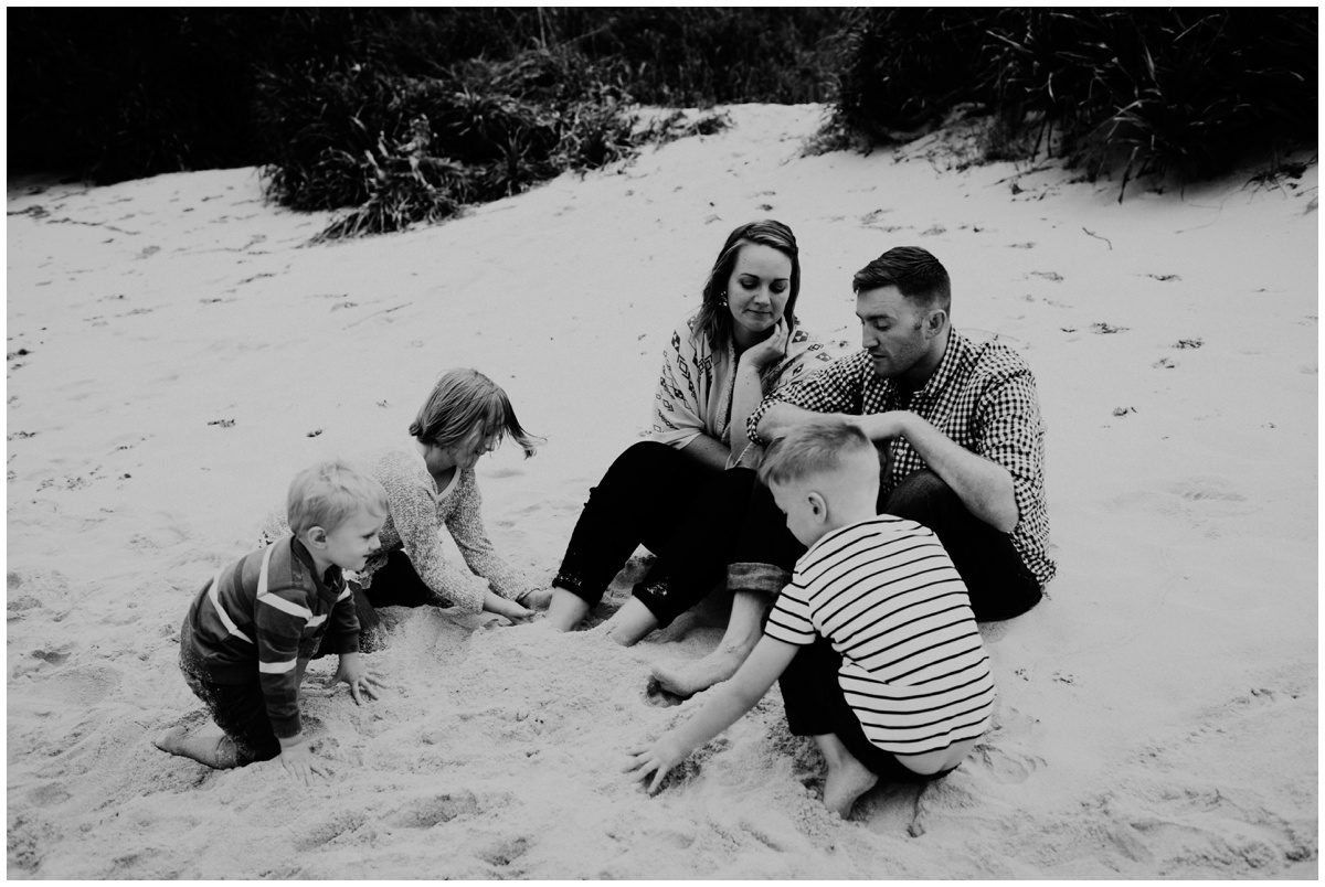 Bloomsburg Worldwide Family Photographer family playing in sand