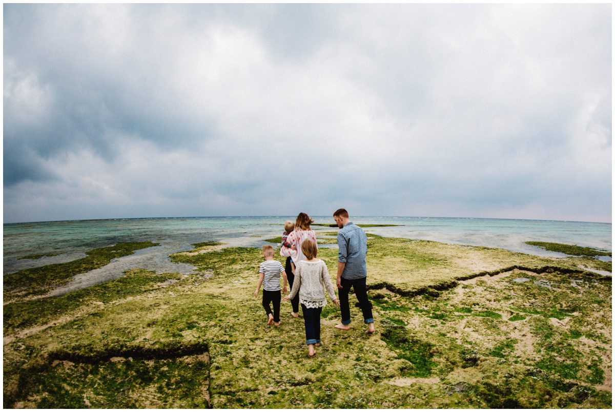 Bloomsburg Worldwide Family Photographer family walking in ocean