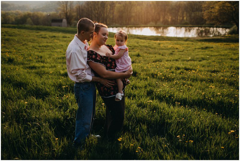 sunset in a field, Adorable Family Portrait Session in Bloomsburg, Pennsylvania