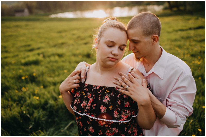 couple by a pond at sunset, Adorable Family Portrait Session in Bloomsburg, Pennsylvania