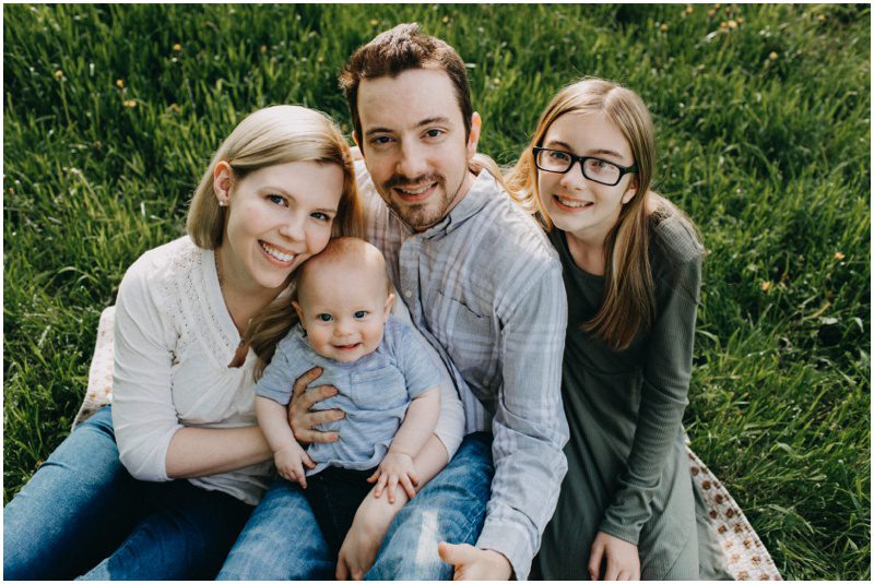 family photo in grassy field, Beautiful Spring Family Portraits in Bloomsburg, Pennsylvania