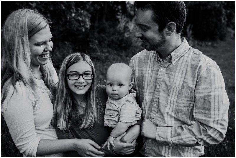 candid black and white family photo , Beautiful Spring Family Portraits in Bloomsburg, Pennsylvania
