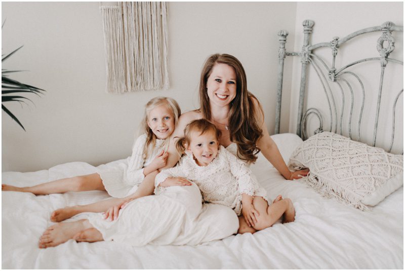 mother and daughters on a bed, Top 10 Images from a Mommy & Me Session in Catawissa Portrait Studio